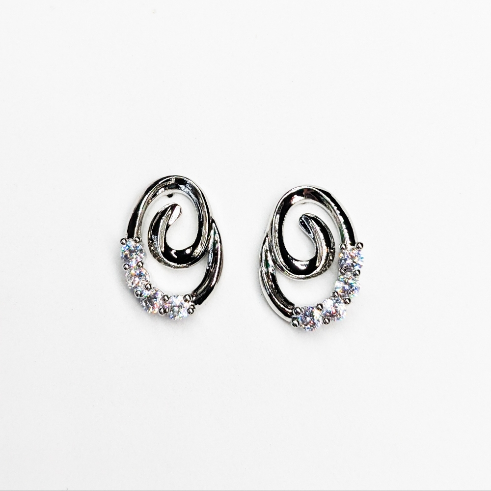 NWT 18k White Gold and Swarovski Crystal Swirl Studs
